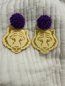 Tiger earrings with purple poms