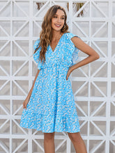 Load image into Gallery viewer, Ruffled Ditsy Floral Surplice Mini Dress